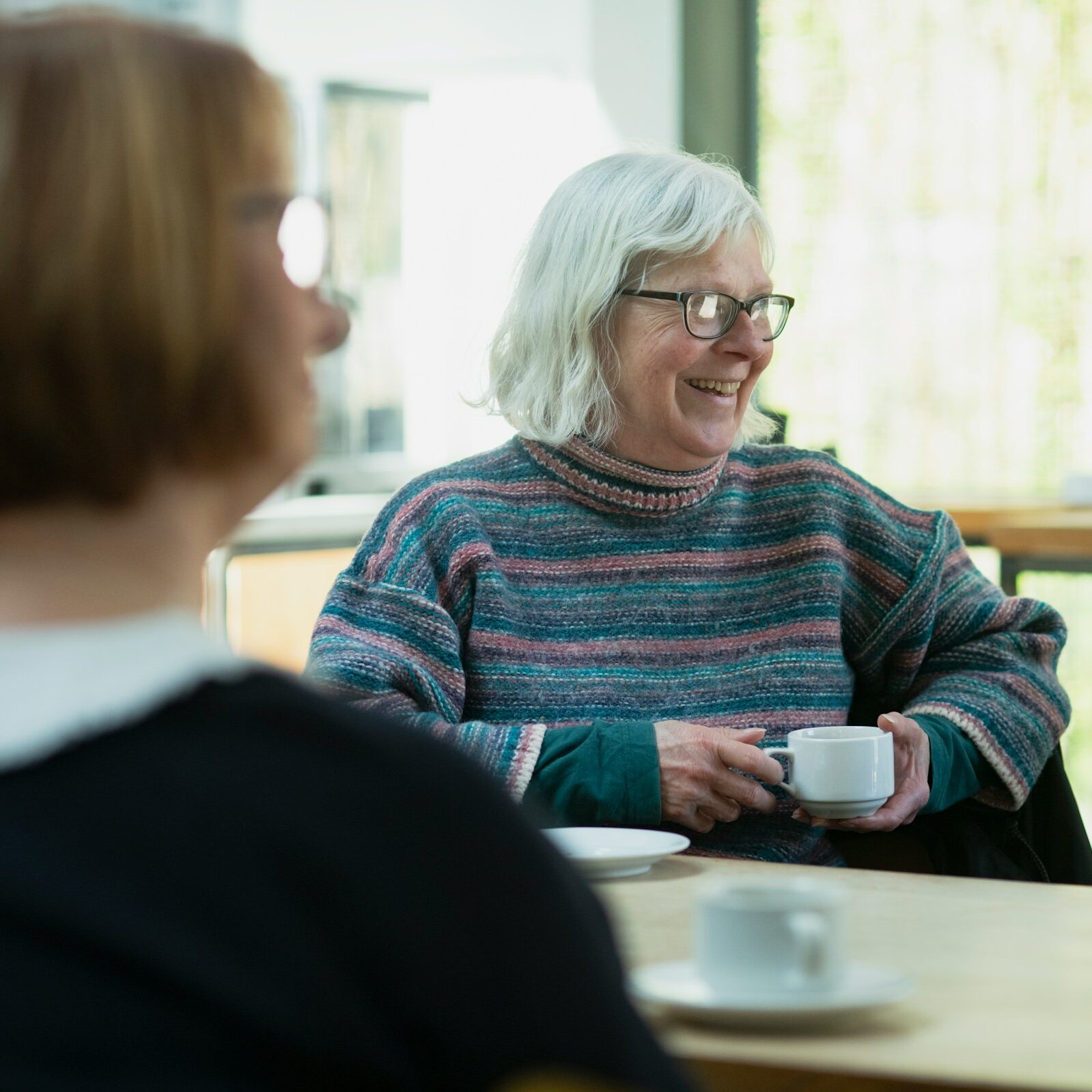 Image of two ladies drinking coffee